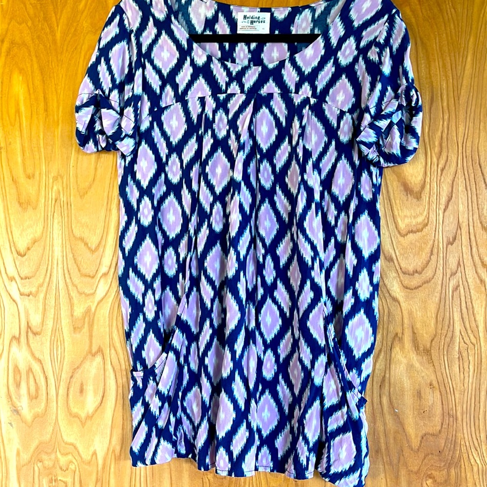 Holding horse by Anthropologie